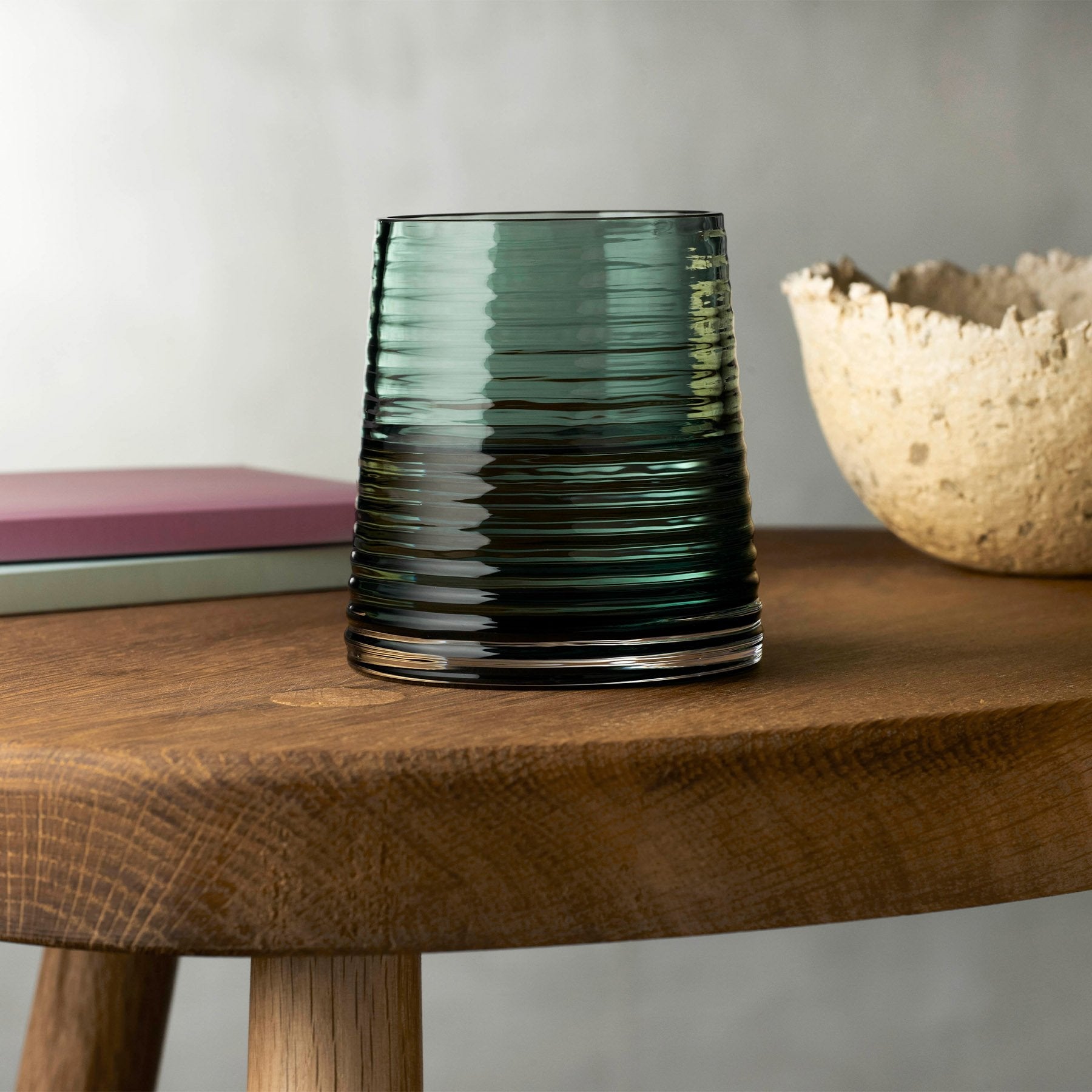 A modern tablescape featuring the Poem crystal water glass set alongside minimalist dinnerware.