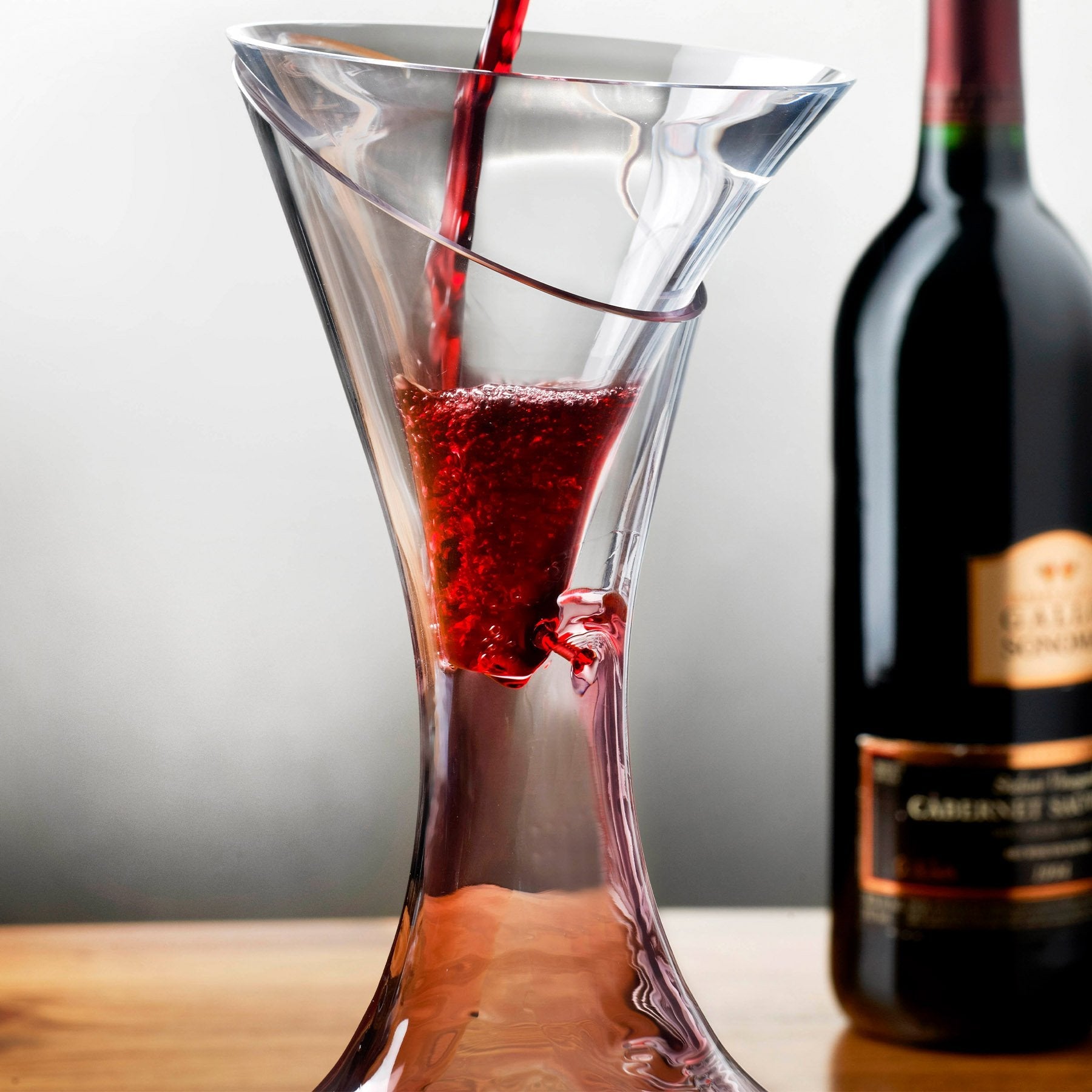 Contemporary glass funnel in a kitchen environment, showing its elegant proportions.