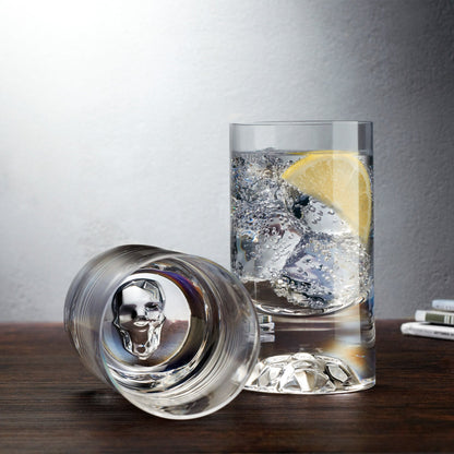 Lifestyle display of the NUDE Glass Shade crystal lowball glasses styled on a modern bar cart.