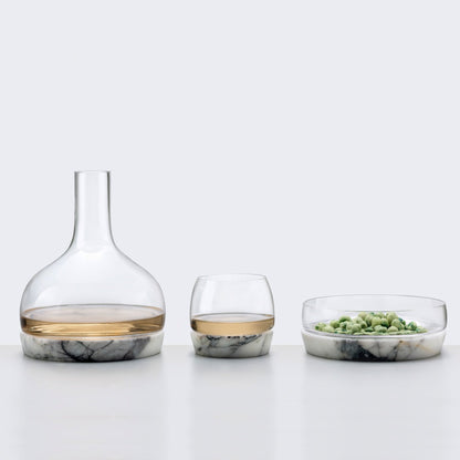 Lifestyle setting of NUDE Chill glassware collection on a contemporary tabletop