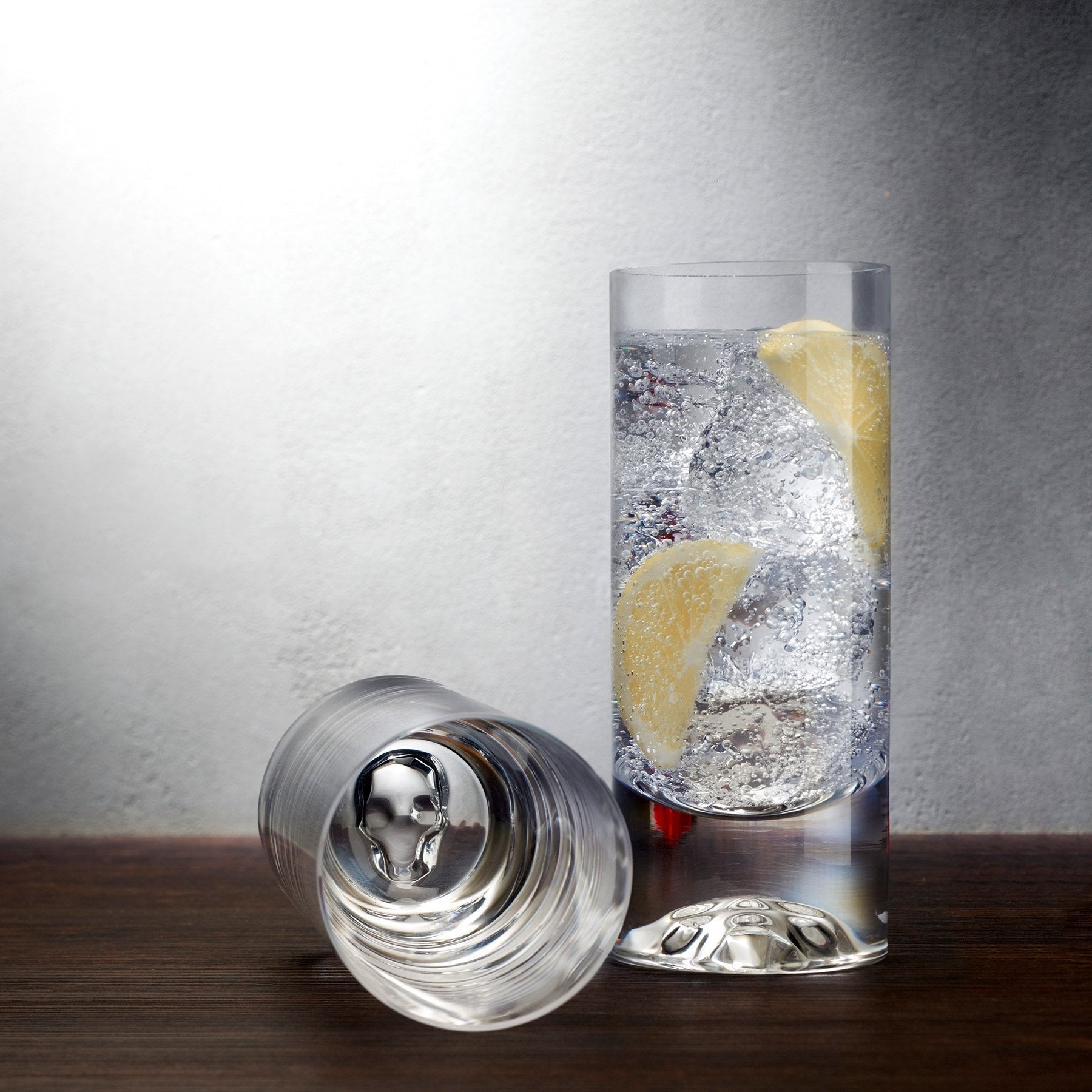 Elegant lifestyle display of the Shade highball glasses arranged on a curated modern tabletop setting.