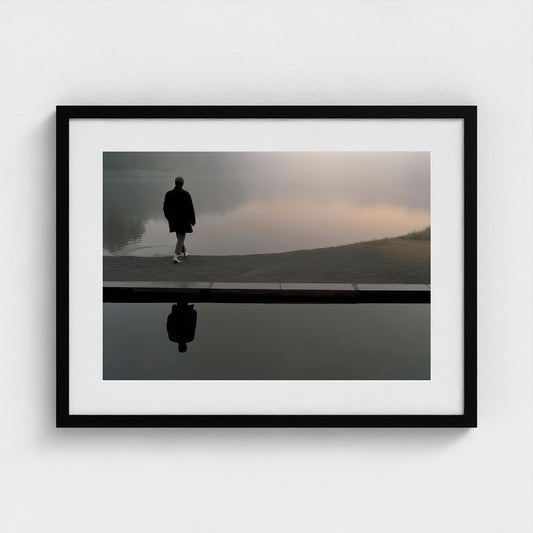 Solitary Figure on Fogged Lakeshore in Taupe Greys