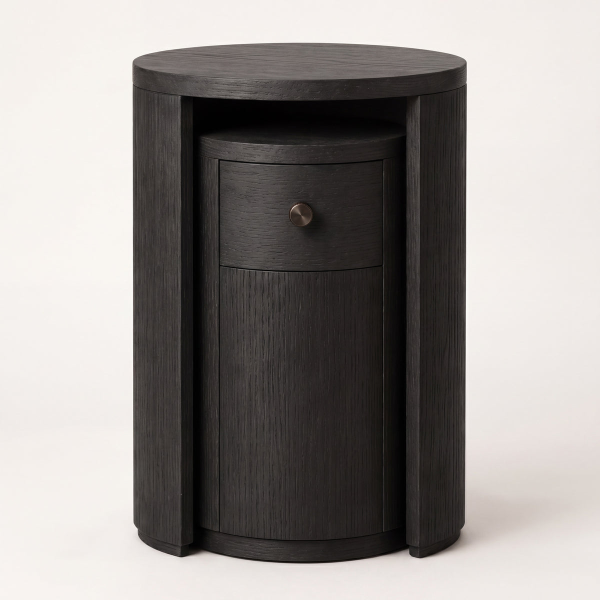 Nested ebony ash wood round side tables showcasing a minimalist silhouette.