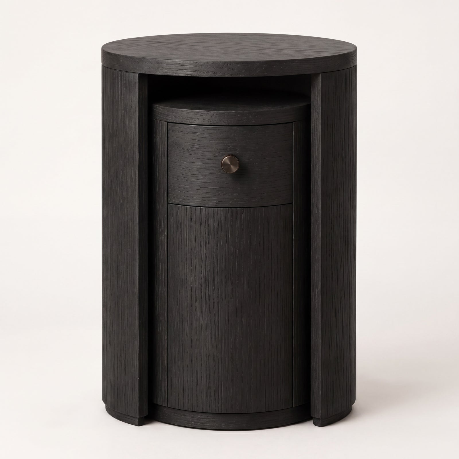 Nested ebony ash wood round side tables showcasing a minimalist silhouette.