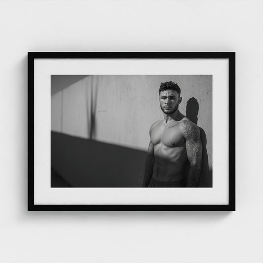 Contemplative Male Portrait Against Concrete Wall