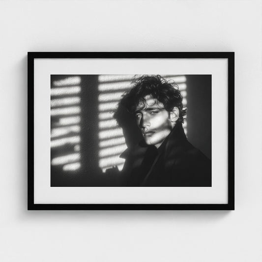 Contemplative Male Portrait in Monochrome Shadow Light