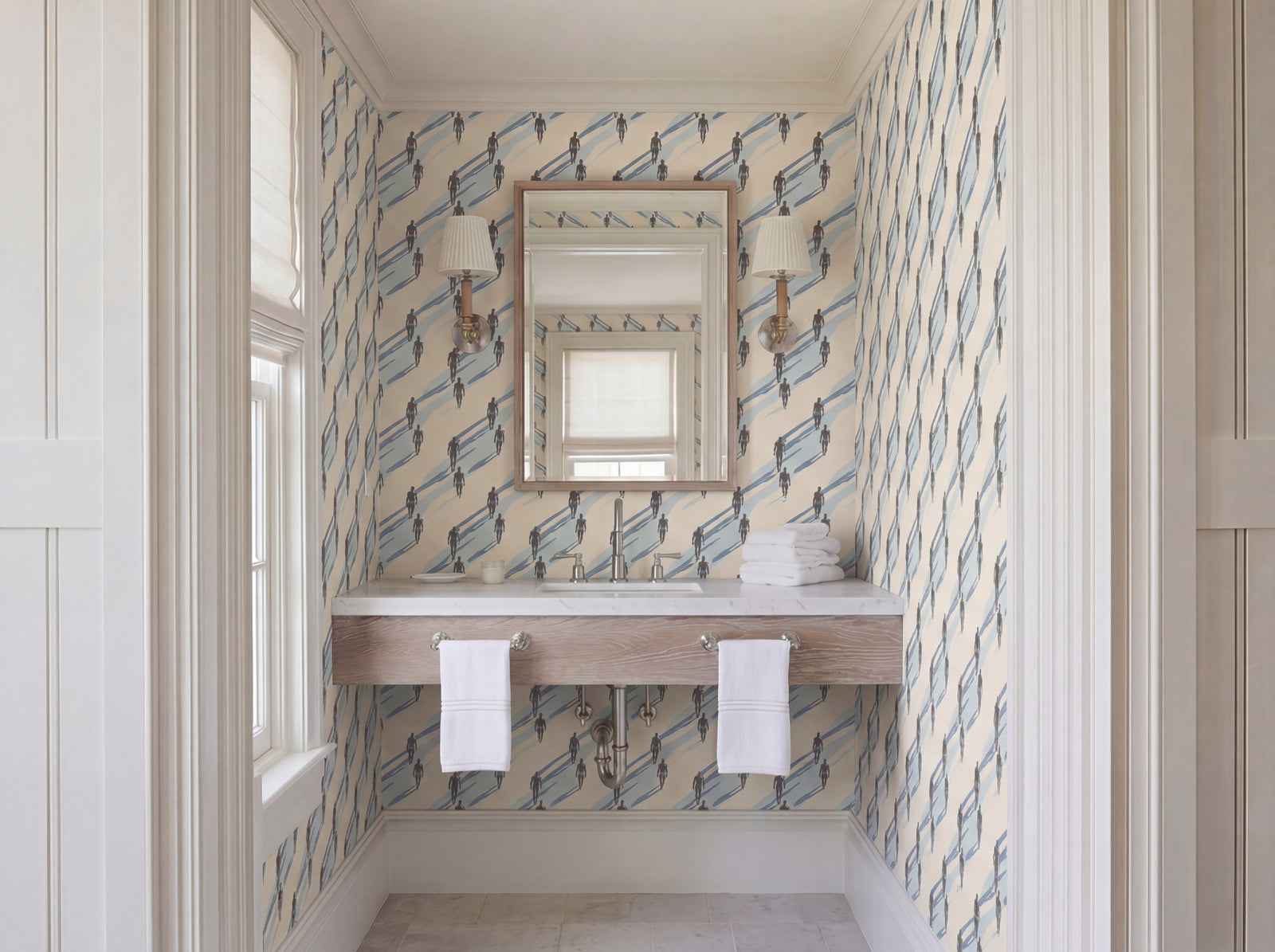 Aegean Shadow wallpaper in a modern living room setting, showcasing the abstract swimmer pattern.