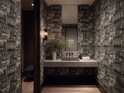 Earth tones colorway of West Village Rooftops wallpaper in a mid-century office.