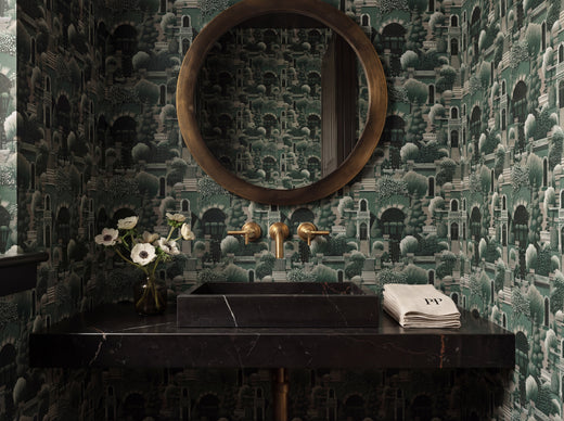 Uptown Architectural Scenic Wallpaper styled in a refined interior