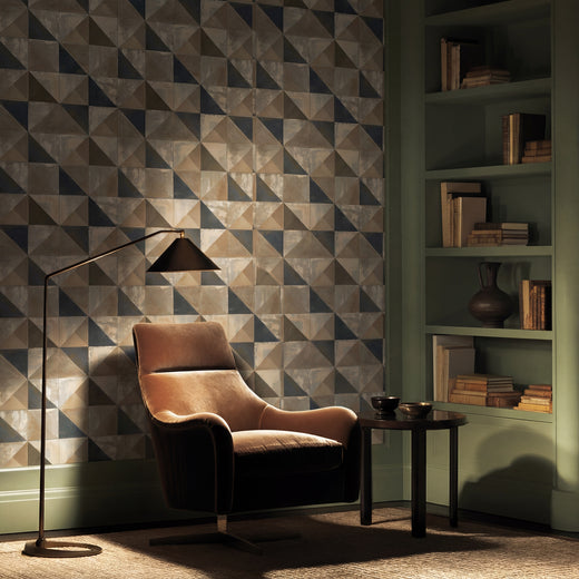 Close-up of Albers-inspired non-pasted wallpaper highlighting the tactile linen-like texture and earthy hues.