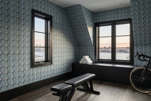 Styled home gym interior with Court Side designer wallpaper adding a fresh, tailored look.