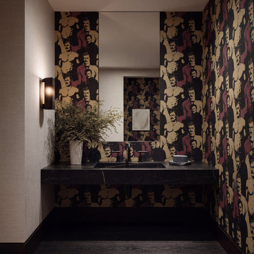 Elegant lounge setting highlighting textured gentleman portrait grasscloth wallpaper