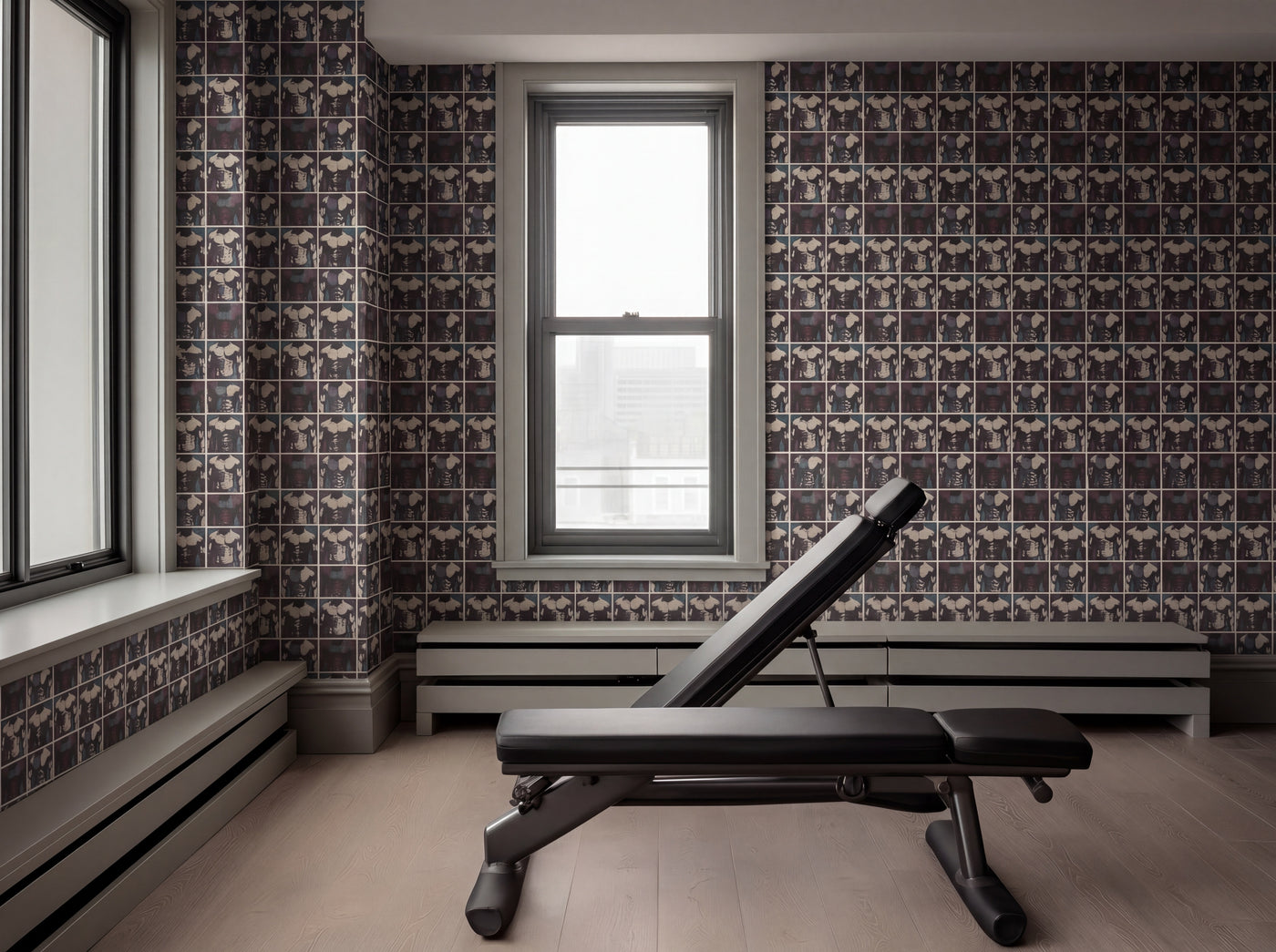 A beautifully styled room featuring ModBod figurative wallpaper on a focal wall with modern interior decor.