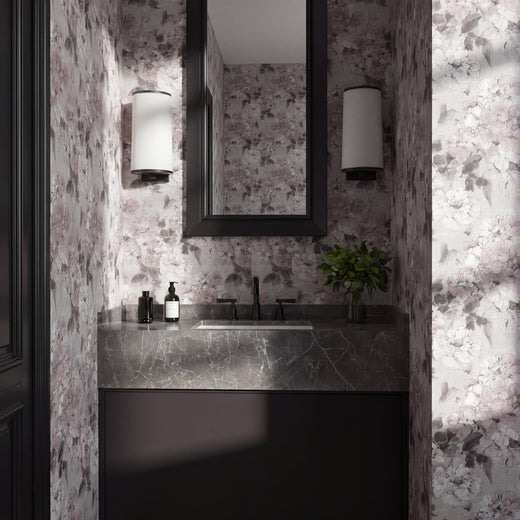 Serene bedroom featuring watercolor flora wallpaper on a statement wall.