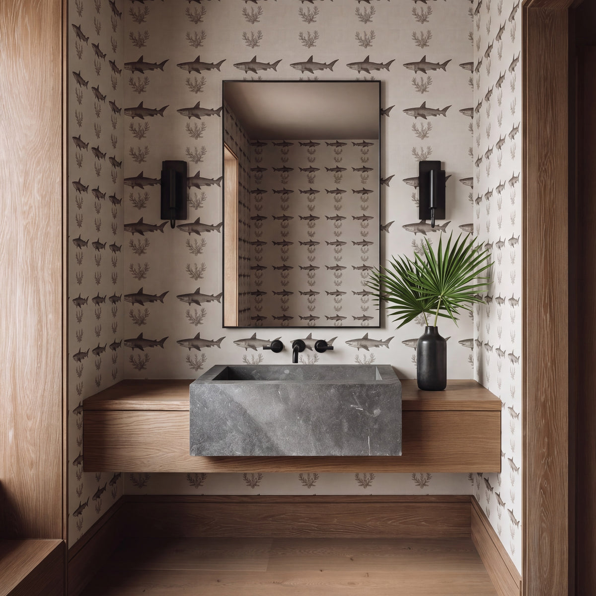 Designer bathroom interior showcasing the bold Solo Swimmer shark wallpaper on a contemporary accent wall.
