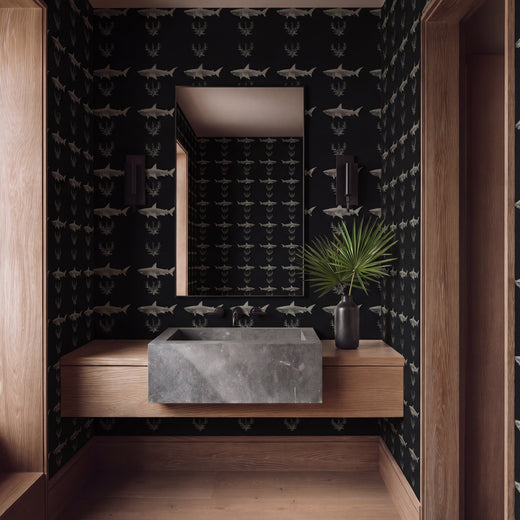 Contemporary powder room styled with the geometric Solo Swimmer shark wallpaper in a bold dark palette.