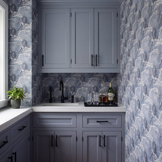 Sophisticated powder room wall decorated with the Neptune mythological wallpaper in soft Mist neutral colorway.