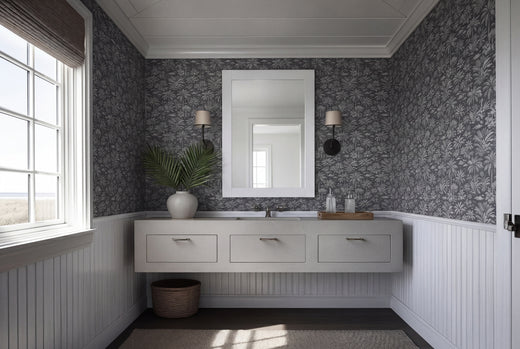 Charcoal Palmy Weather tropical wallpaper styled beautifully in a sophisticated living space.