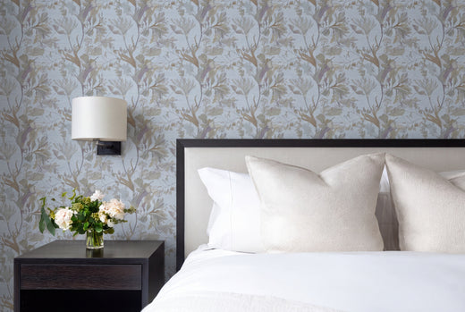 Ethereal seaweed and foliage wallpaper in a styled residential bedroom setting.