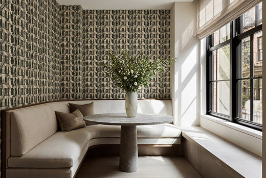 Clean and modern White Greenwich Village narrative wallpaper installed in a bright dining area.