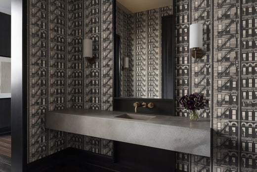 Ambient room scene featuring the artistic cityscape wallpaper on a feature wall