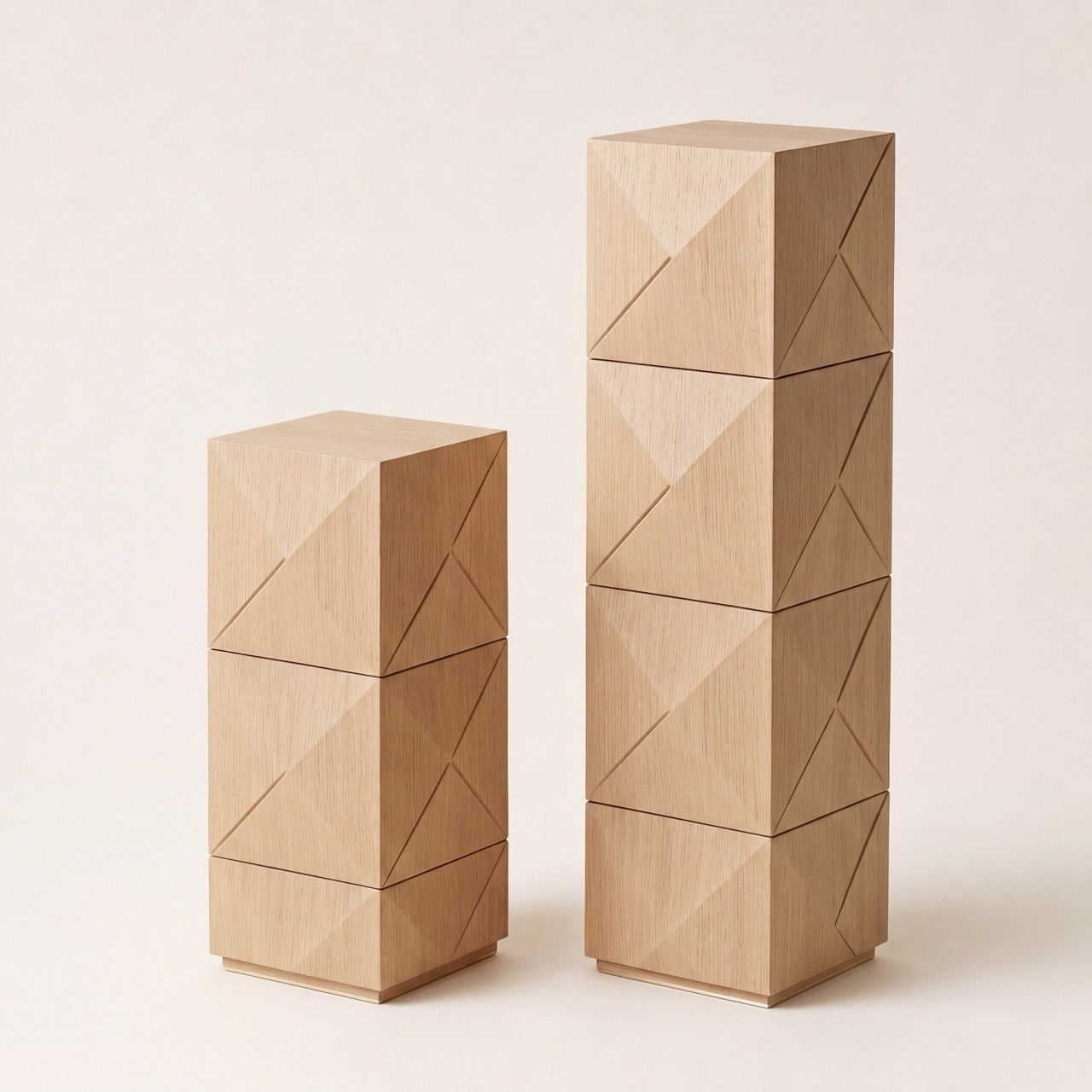 Two neoclassical style wooden display stands in differing heights against a neutral backdrop.