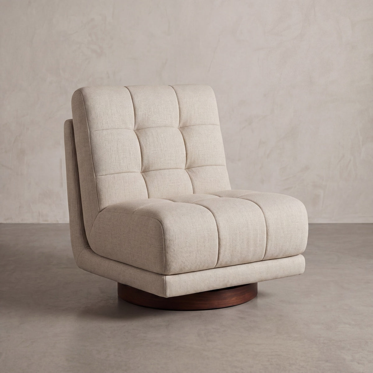 Bespoke Puffer swivel lounge chair in a luxury neutral fabric, showcasing its plush, rounded silhouette.