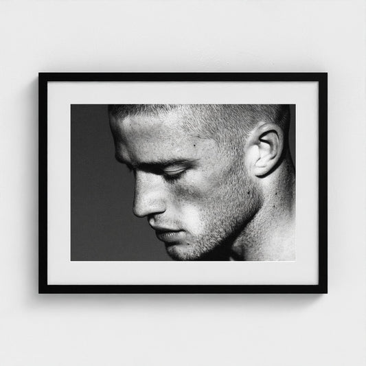 Contemplative Male Portrait in Soft Grey Tones