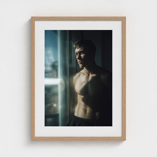 Contemplative Window Portrait in Soft Tonal Light