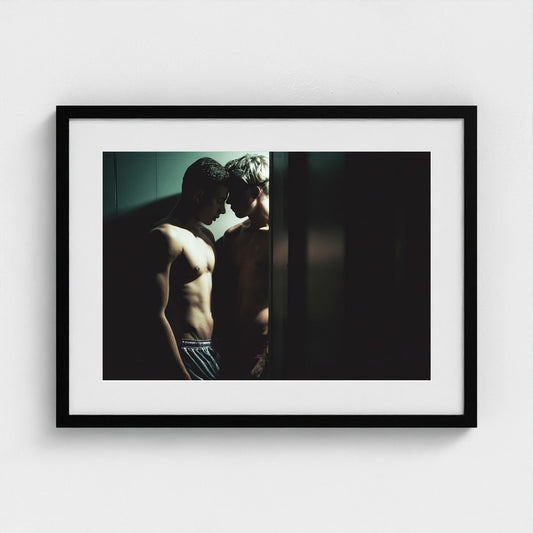 Intimate Portrait of Two Men in Shadowed Light