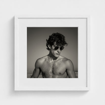Minimalist monochrome portrait print in a 16x16 inch gallery-style white frame.