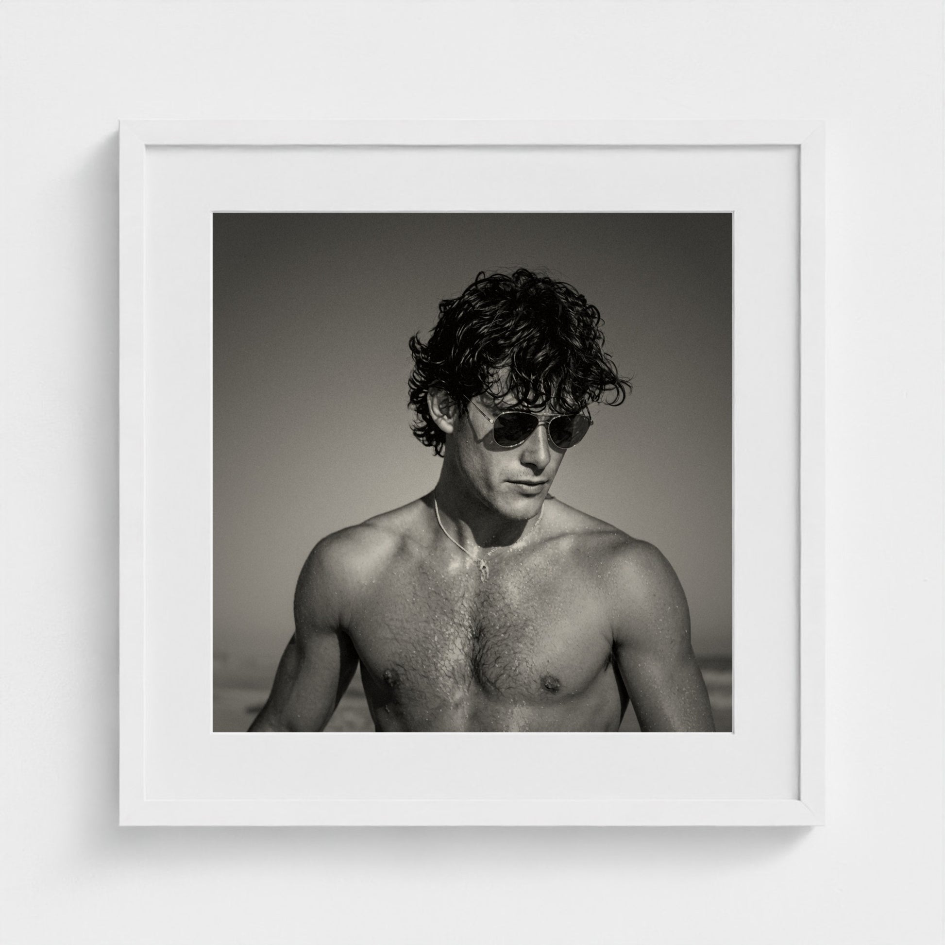 A 20x20 inch elegant black and white portrait art print beautifully finished in a white frame.