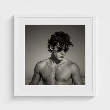 A 20x20 inch elegant black and white portrait art print beautifully finished in a white frame.