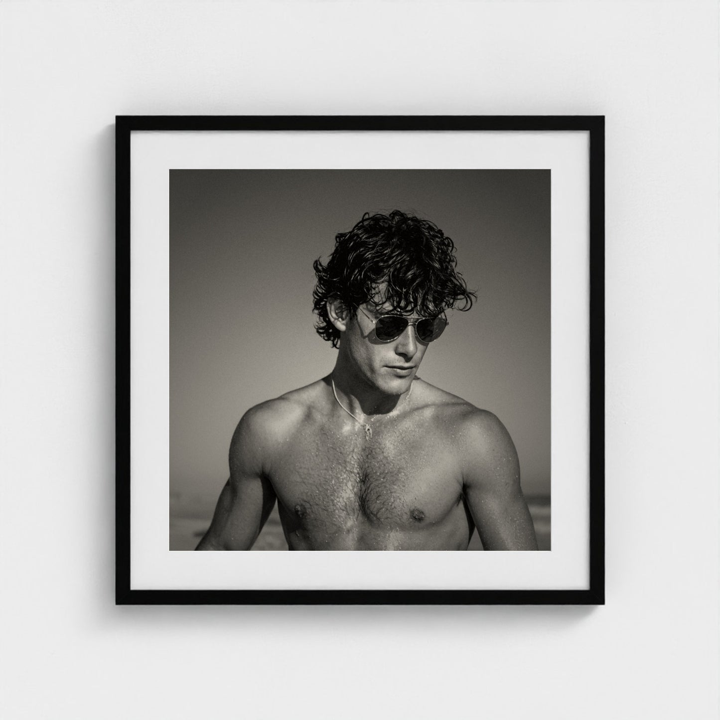 Coastal Gaze portrait study art print within a sleek 24x24 inch black wood frame.