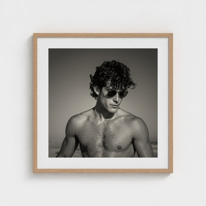 Large 24x24 inch monochrome coastal fine art print paired with a natural oak frame.