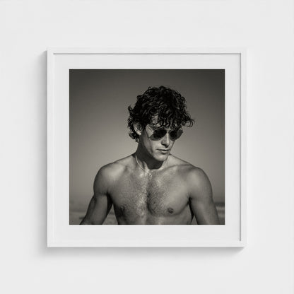 Sophisticated black and white portrait print featured in a 24x24 inch clean white frame.
