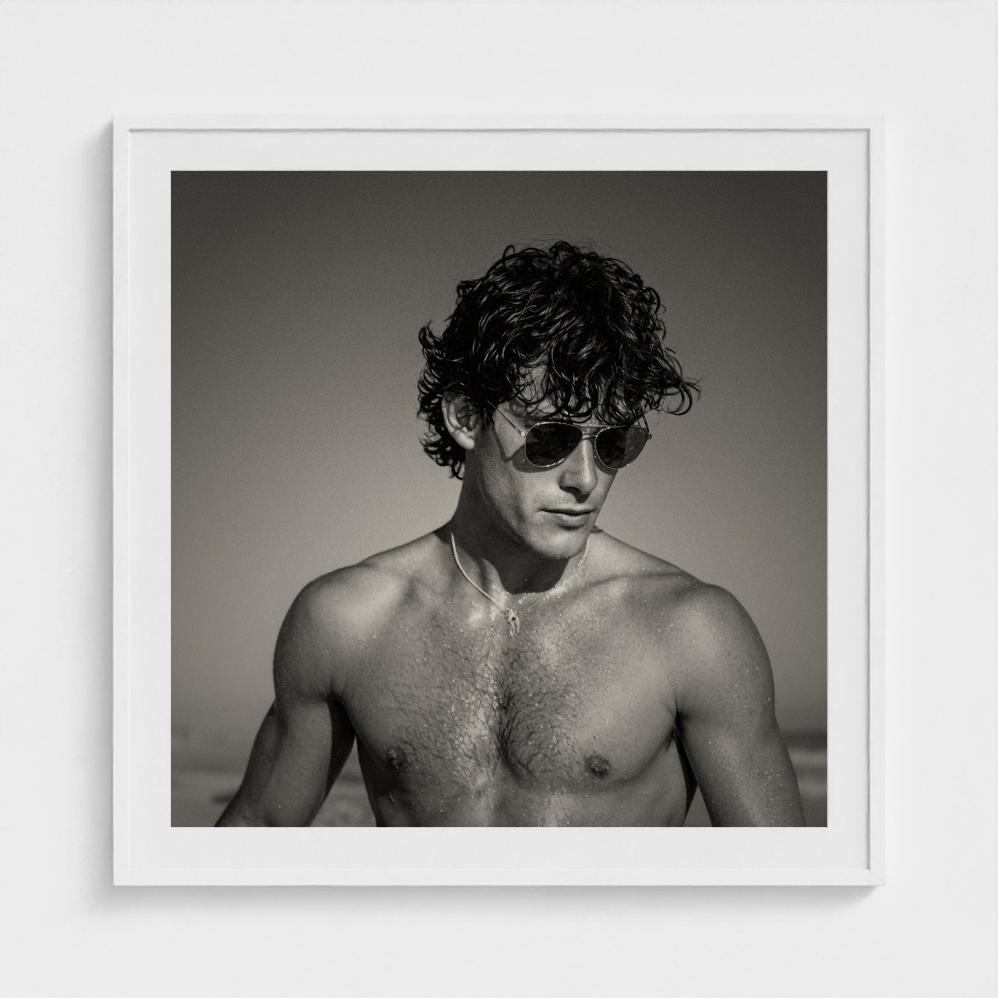 Elegant 30x30 inch monochrome portrait print framed in clean contemporary white.