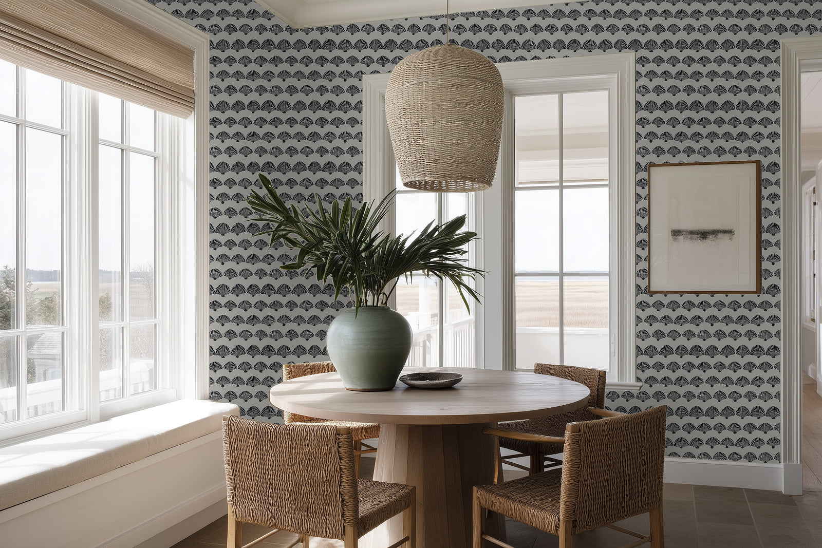 An elegant dining room featuring beige wave-patterned scallop wallpaper on the walls.