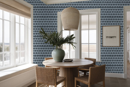 The Modern Scallop wallpaper in a rich blue colorway inside a formal dining room.