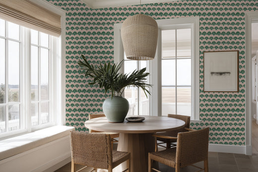 Chic pink geometric scallop wallpaper in a contemporary styled dining space.