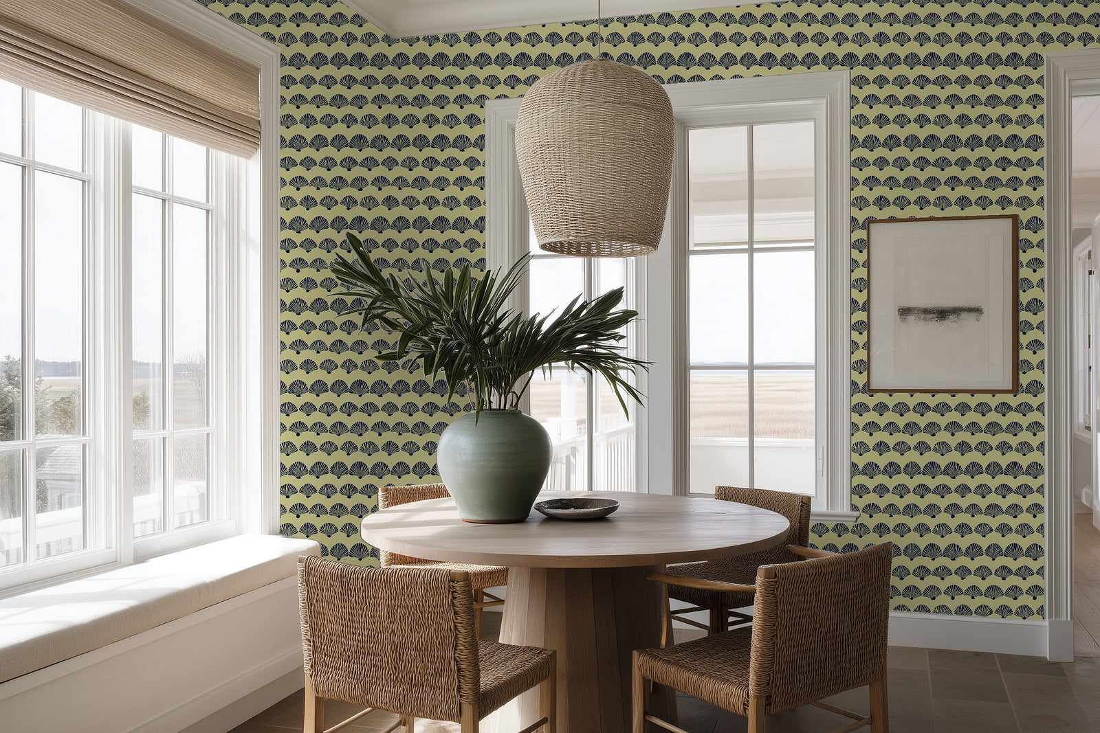 A warm dining room styled with the sunny yellow Modern Scallop geometric wallpaper.