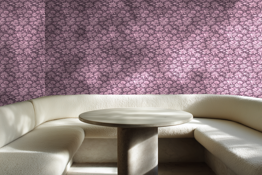 Palmy Weather Pink wallpaper styled in a bright, cozy breakfast nook.