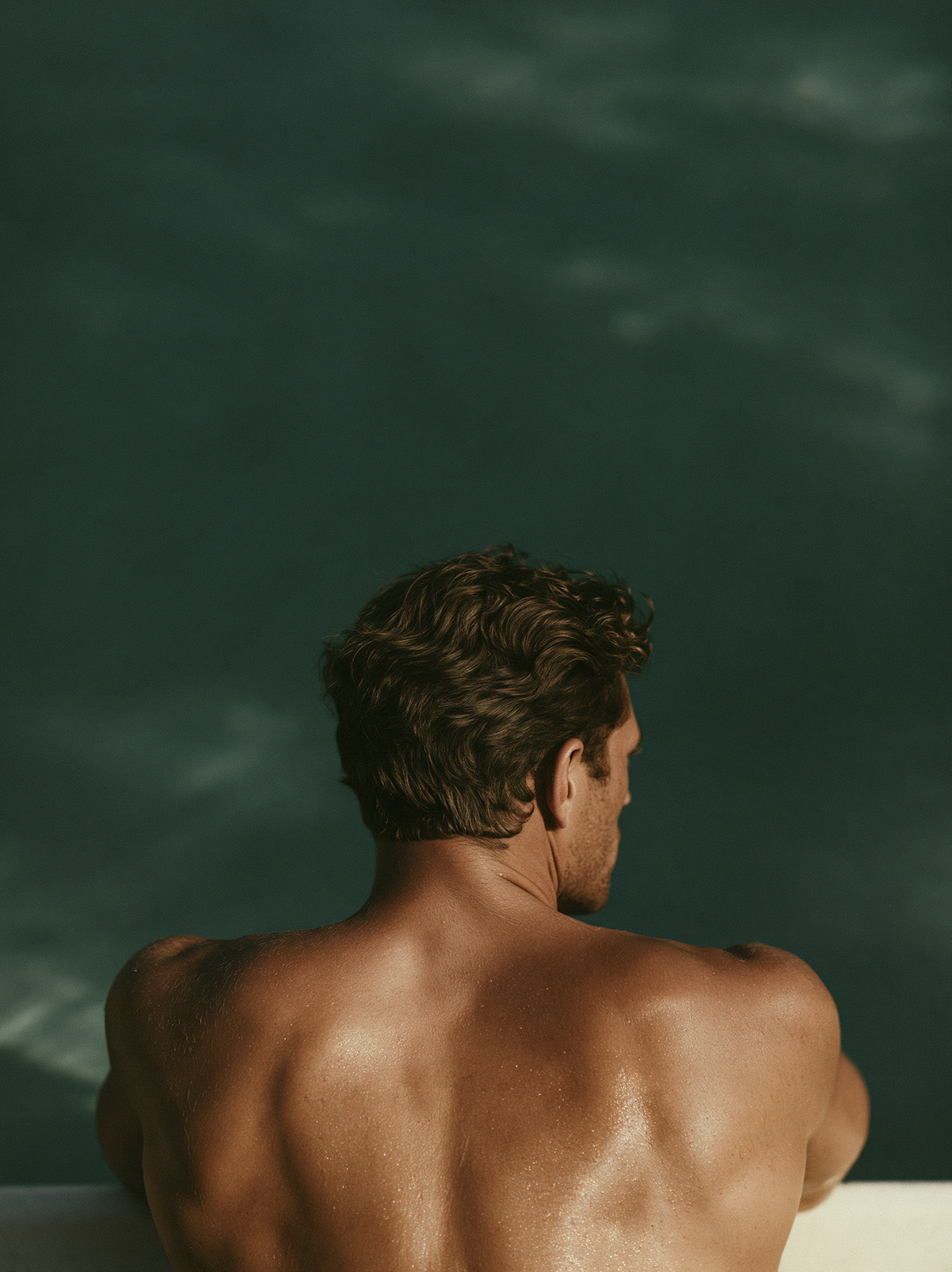 3D Source Artwork - Pool Side male swimmer seated at a deep green swimming pool