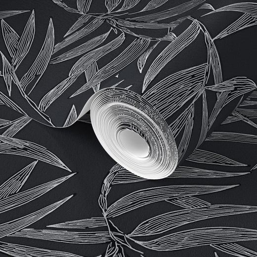 Close-up of a rolled wallpaper sample in the Smoke bamboo design.