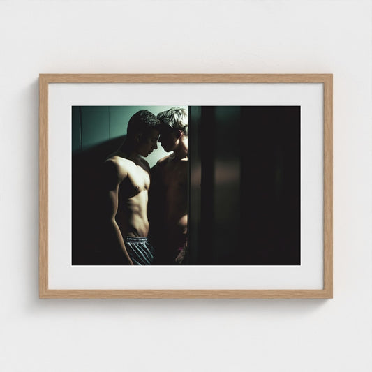Intimate Portrait of Two Men in Shadowed Light