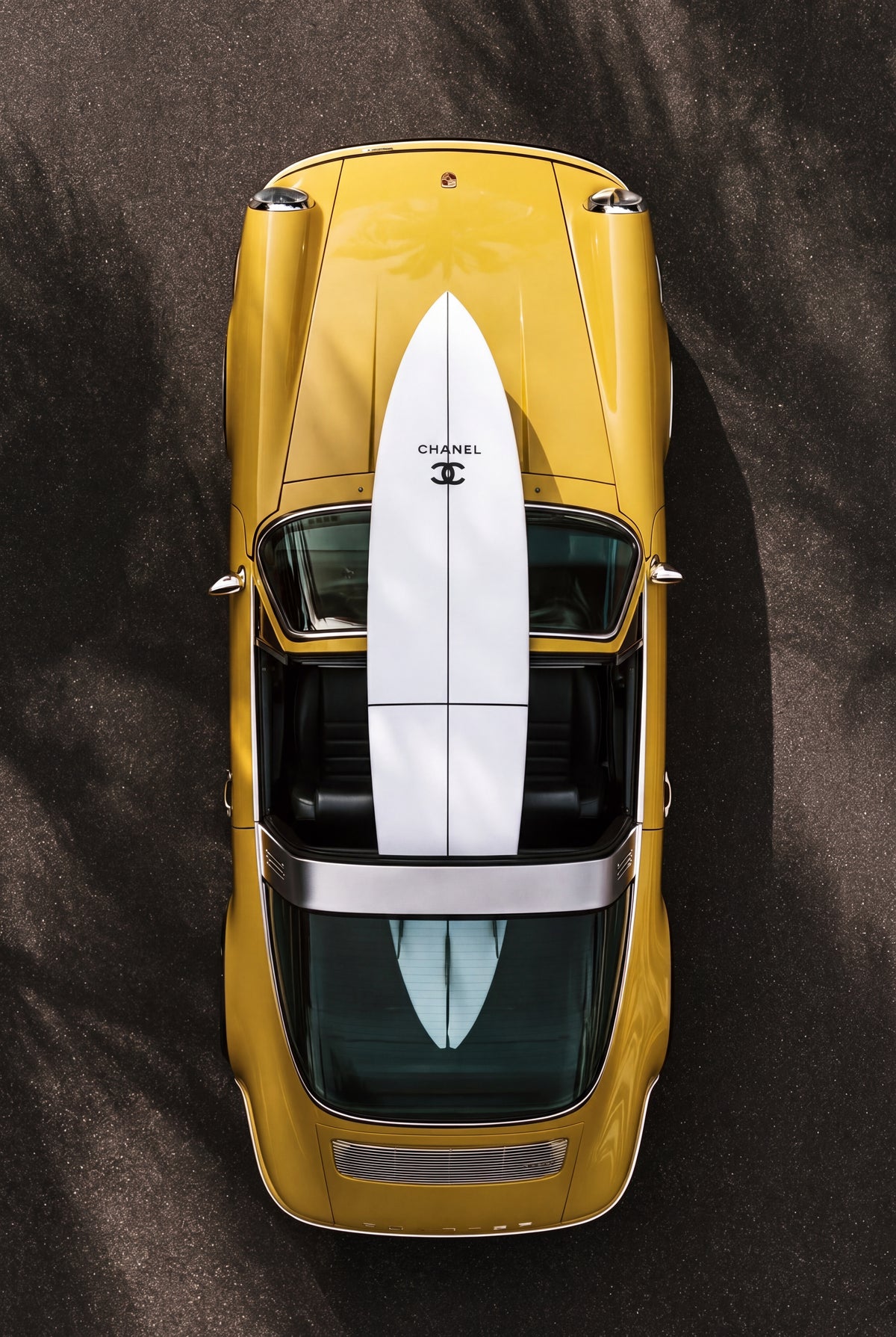 3D Source Artwork - Yellow Porsche seen from above with a white surfboard