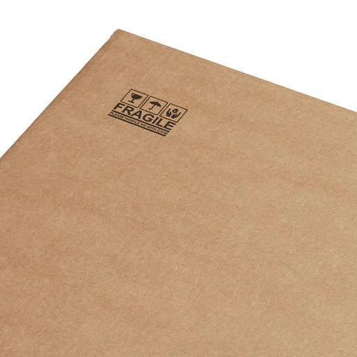 Protective cardboard shipping carton marked fragile